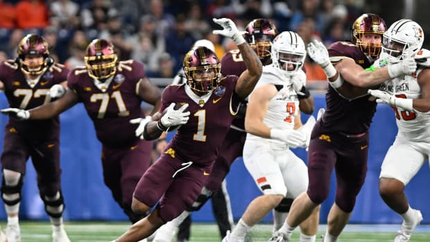 Minnesota running back Darius Taylor (1) runs the ball against Bowling Green in the third quarter at Ford Field in Detroit on Dec. 26, 2023.